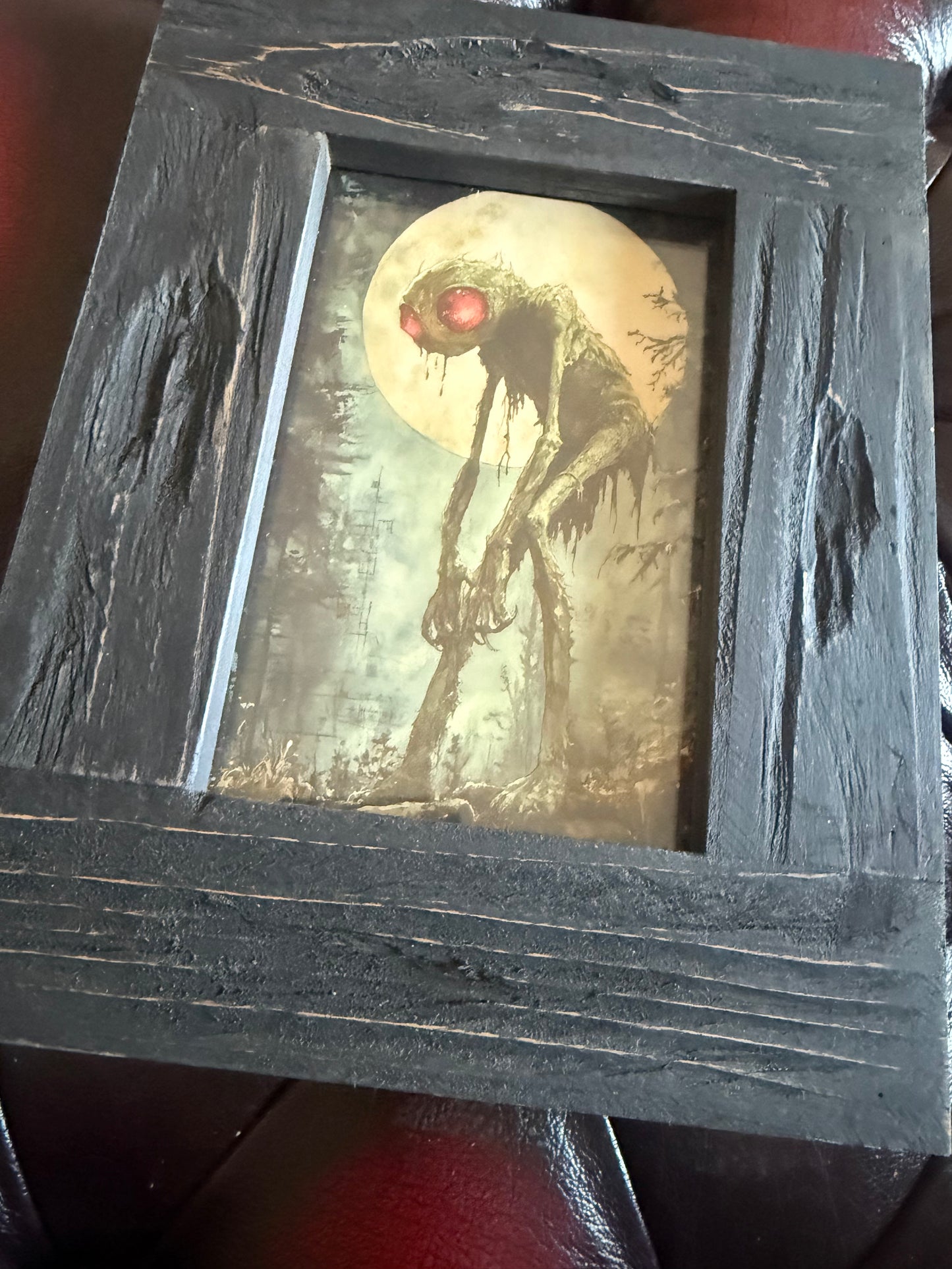 Old Red Eyes A6 Print in Rustic Wooden Frame