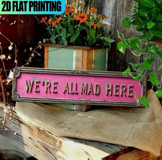 We’re All Mad Here Metal Sign